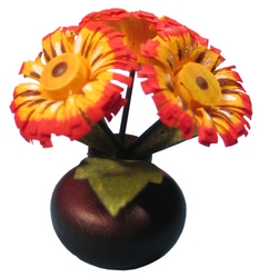 Vase mit drei Blumen